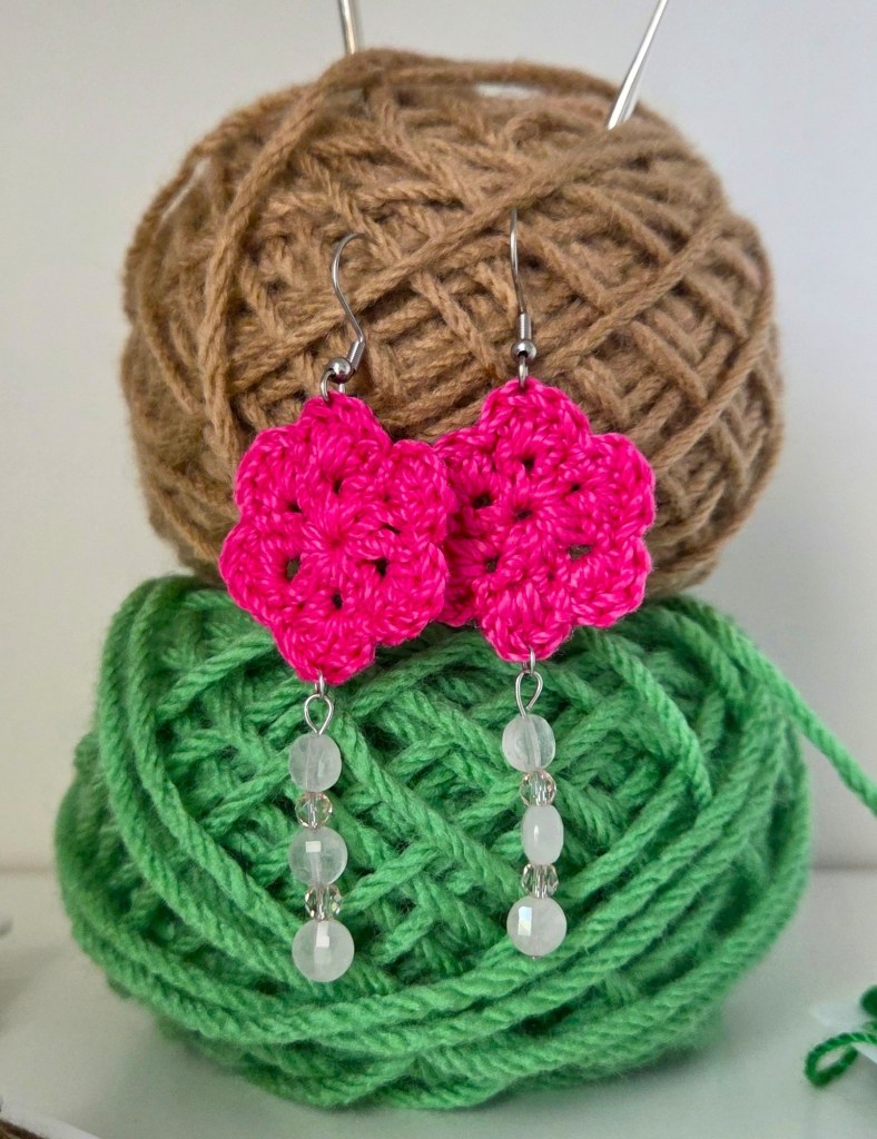 Crochet flower earrings with daggers from the Prickly Petals collection