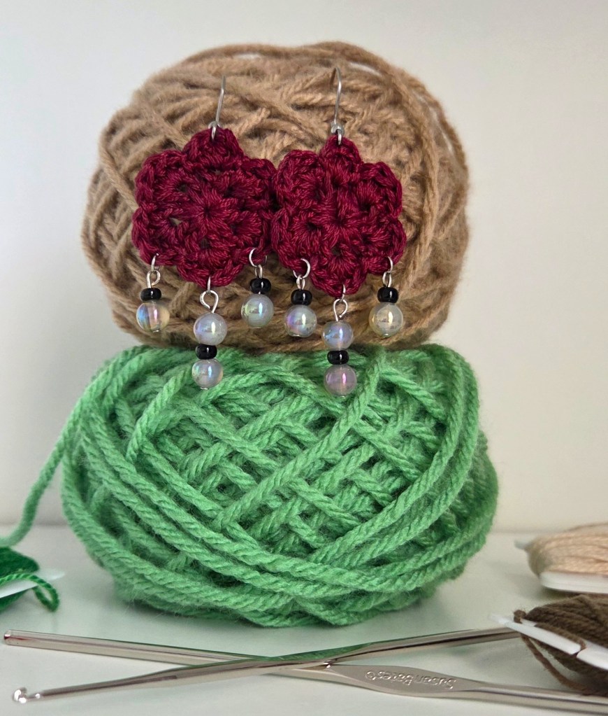 Crochet flower earrings with daggers from the Prickly Petals collection